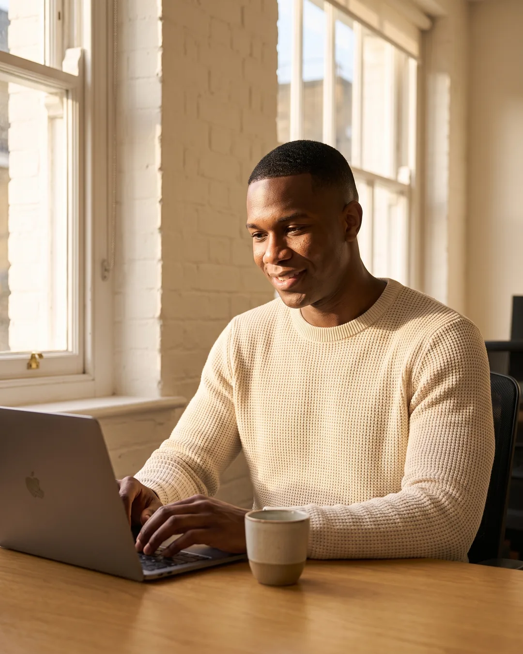 A London business owner replying to new customer enquiries
