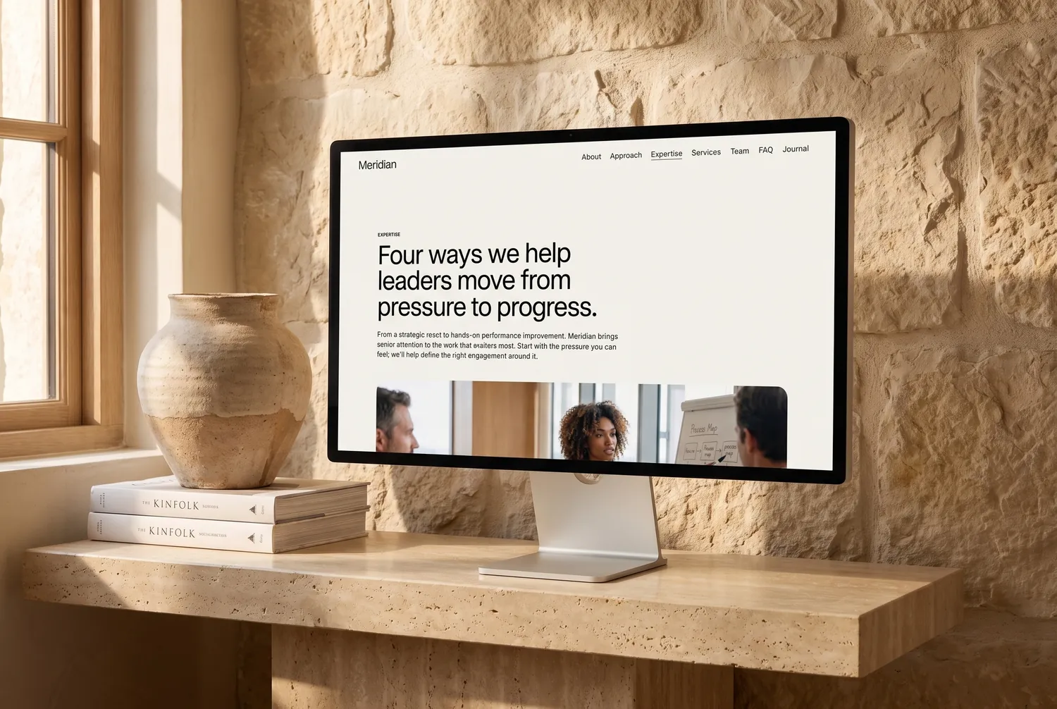 Meridian template expertise page on a large display — &lsquo;Four ways we help leaders move from pressure to progress&rsquo;