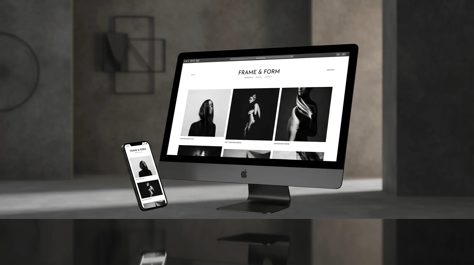 Premium Squarespace website design displayed on a desktop monitor and phone in a warm, minimal studio