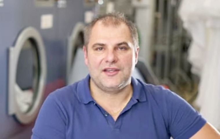 Costa, Owner of Cosmopolitan Dry Cleaners