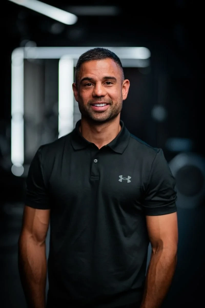 Charlie Brahmbhatt, founder of Impact Physio and specialist physiotherapist, in his London clinic