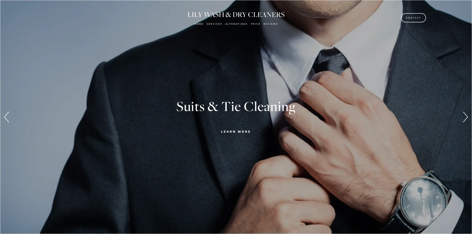 Lily Wash & Dry Cleaners website homepage — suits and tie cleaning hero with elegant serif typography